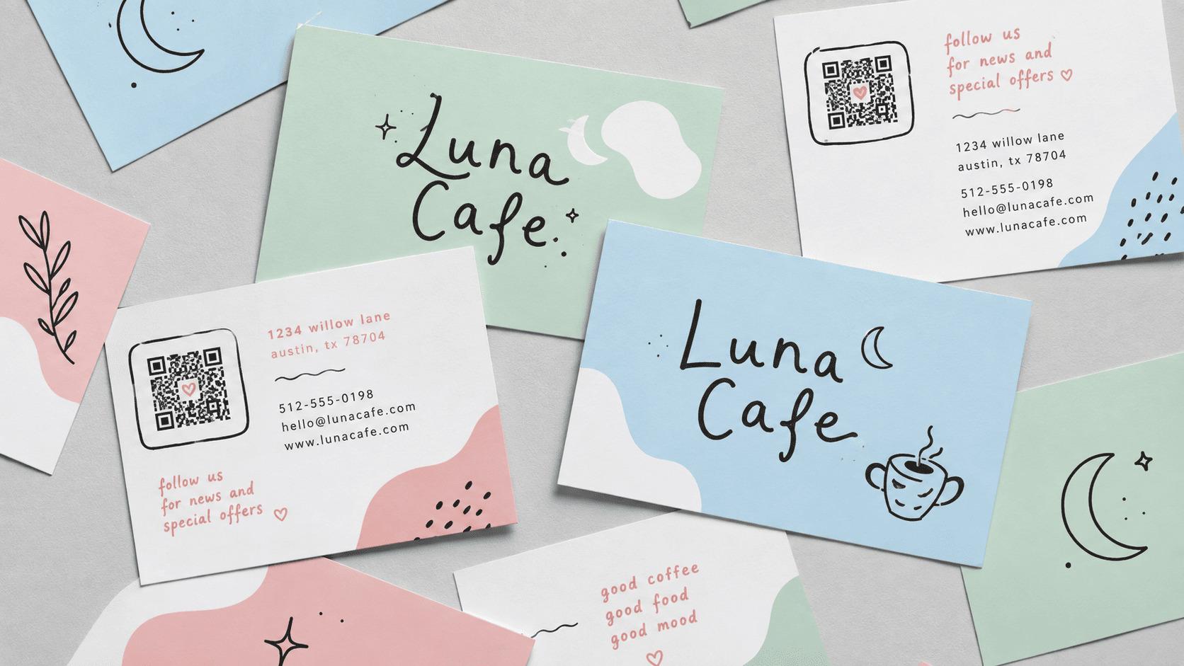 Branded QR business cards arranged in a styled flatlay